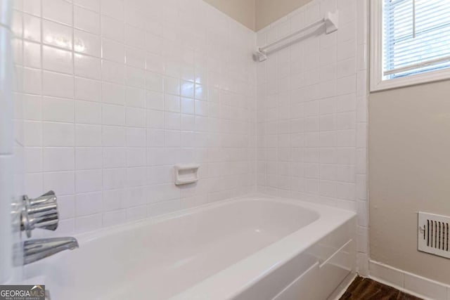 6275 S Skyline Dr, Douglasville, GA 30135 - bathroom with baseboards, wood finished floors, and visible vents