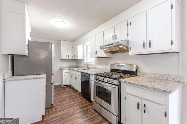 6275 S Skyline Dr, Douglasville, GA 30135 - kitchen with a sink, under cabinet range hood, stainless steel appliances, white cabinetry, and dark wood-type flooring