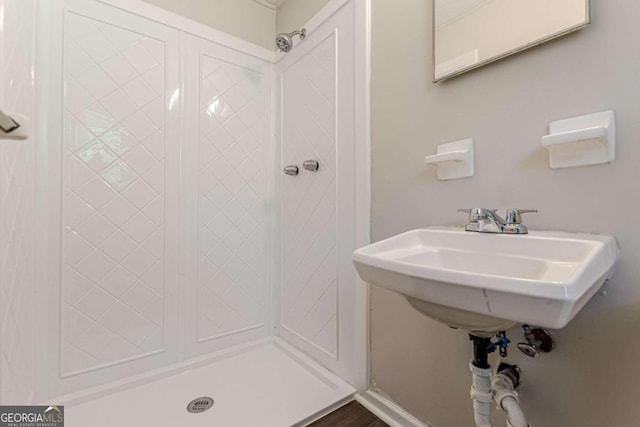 bathroom featuring walk in shower