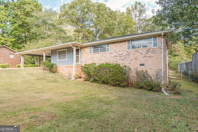 6275 S Skyline Dr, Douglasville, GA 30135 - single story home featuring brick siding, fence, a front yard, and a carport