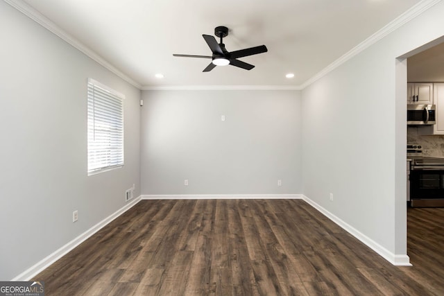 unfurnished room with ornamental molding, dark hardwood / wood-style floors, and ceiling fan