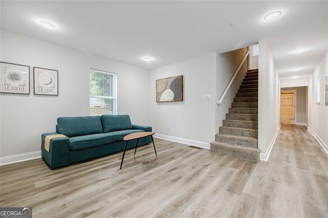 living area featuring light hardwood / wood-style floors