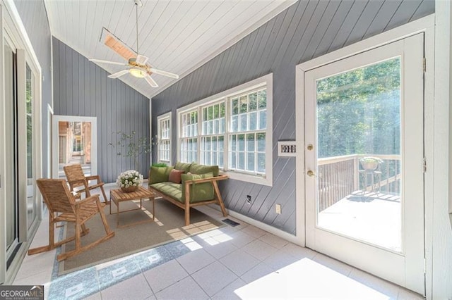 sunroom / solarium featuring vaulted ceiling and ceiling fan