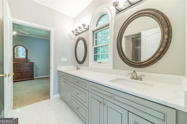 bathroom featuring tile patterned floors, vanity, and ceiling fan