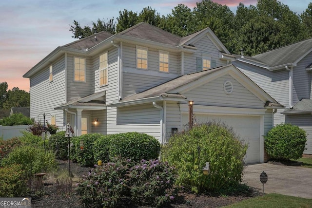 view of front of property with a garage