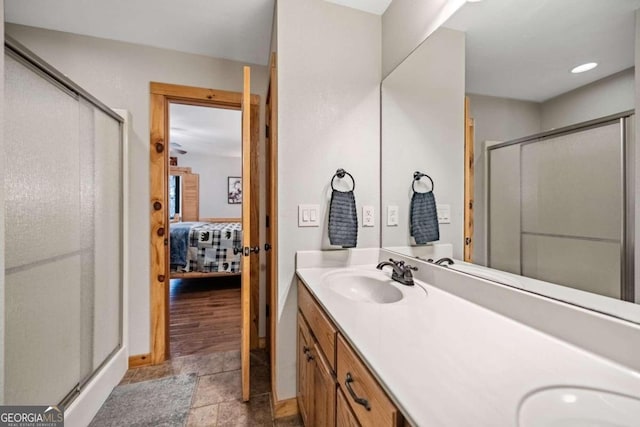 bathroom featuring vanity and walk in shower