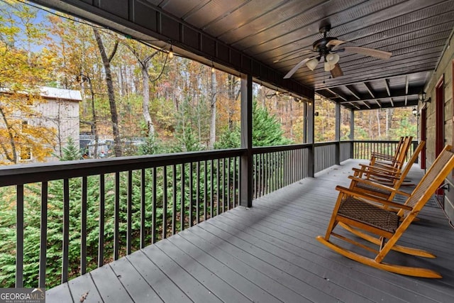 wooden deck with ceiling fan