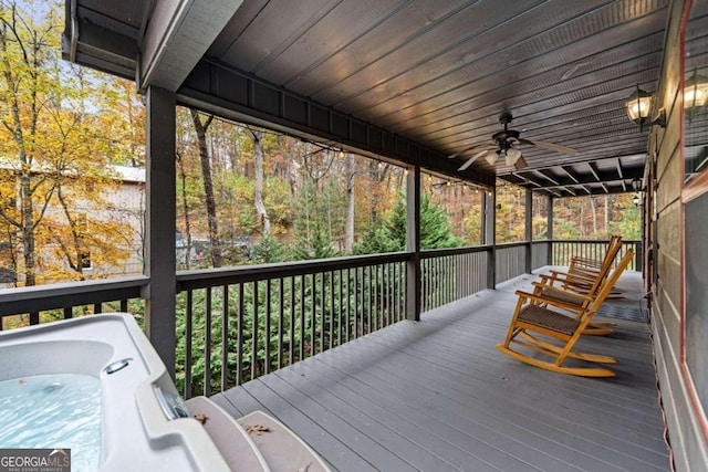 wooden deck with ceiling fan