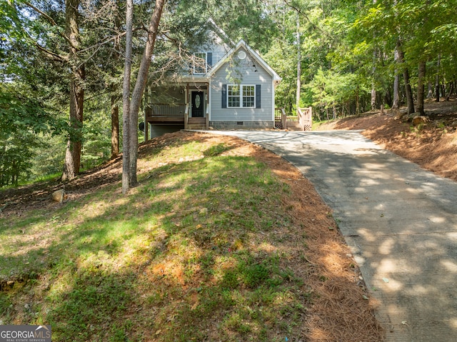 view of property featuring a front yard