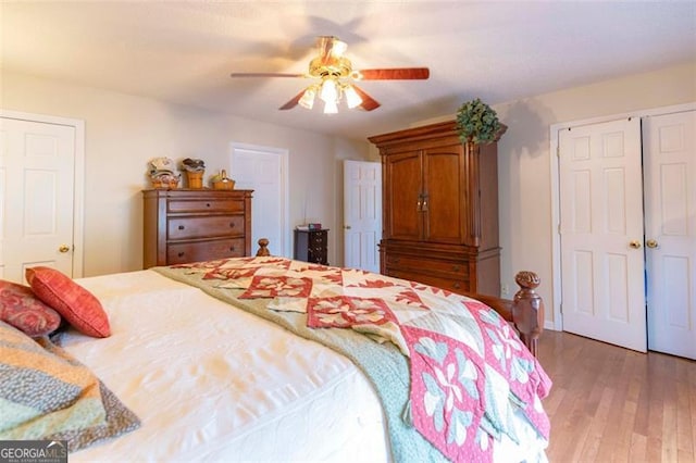 bedroom featuring light hardwood / wood-style floors and ceiling fan