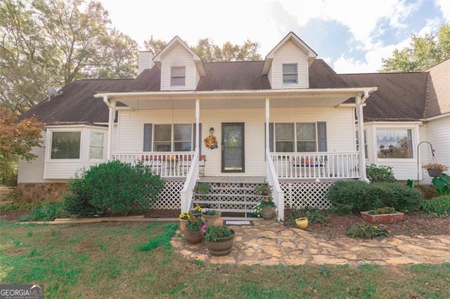 cape cod house with a porch