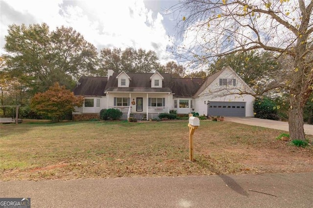 cape cod-style house featuring a garage, covered porch, and a front lawn