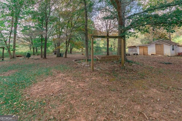 view of yard with a shed