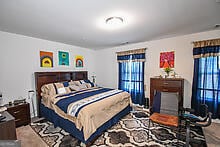 bedroom featuring multiple windows