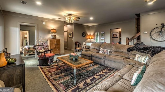 carpeted living room featuring ceiling fan