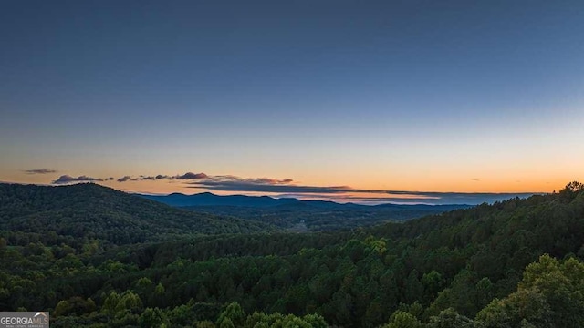 mountain view with a water view