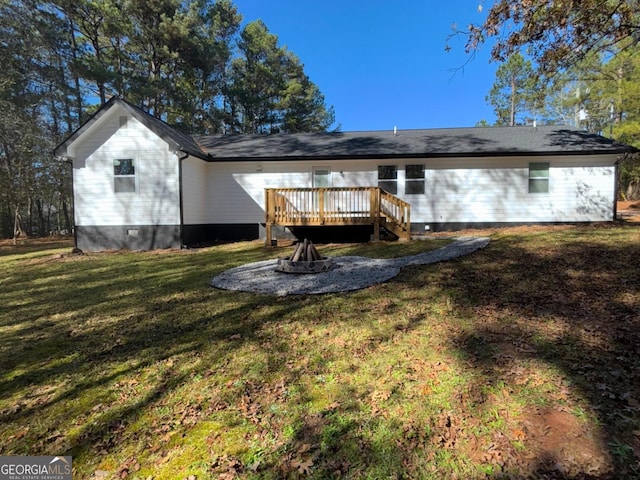 view of exterior entry featuring a deck