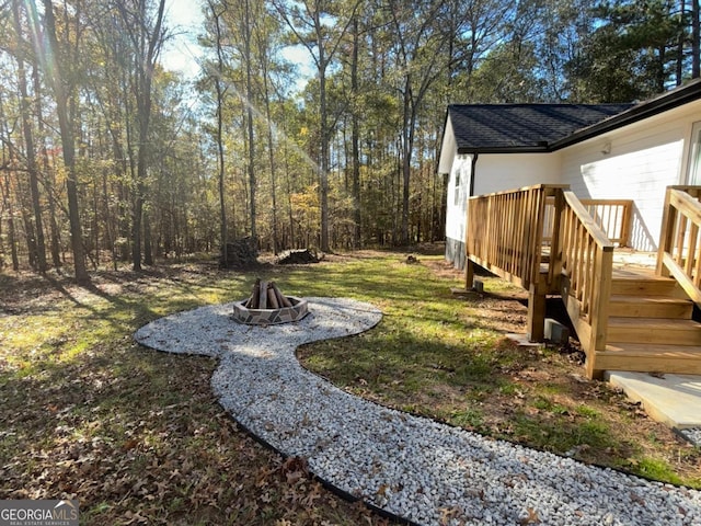 ranch-style home featuring a yard