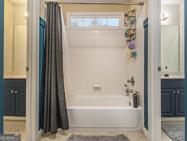 bathroom featuring shower / tub combo, vanity, and tile patterned floors