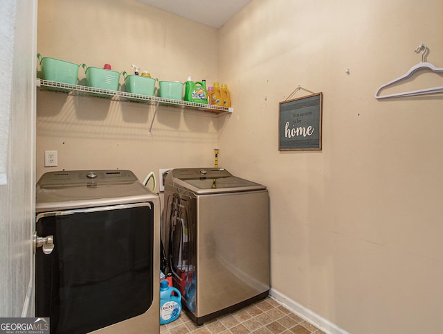 laundry area featuring washing machine and dryer