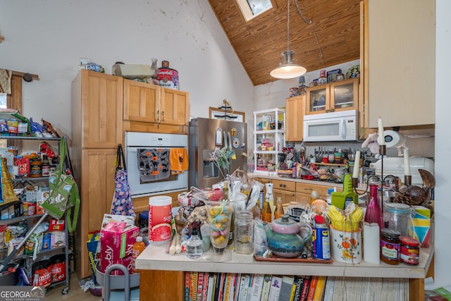 kitchen featuring hanging light fixtures, white appliances, wood ceiling, and lofted ceiling with skylight