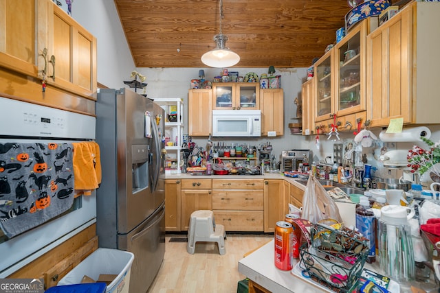 kitchen with stainless steel fridge, light wood-type flooring, pendant lighting, refrigerator, and wooden ceiling