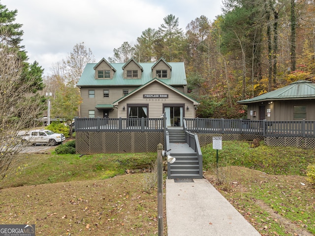 view of front of house with a deck