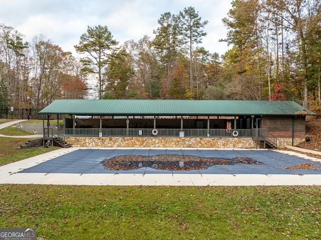 exterior space featuring a front lawn