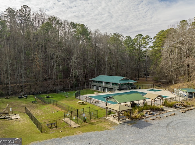 view of pool with a lawn and a gazebo