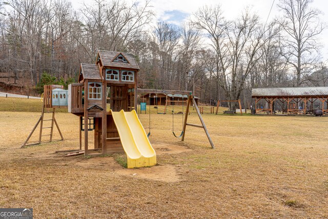 view of jungle gym featuring a yard