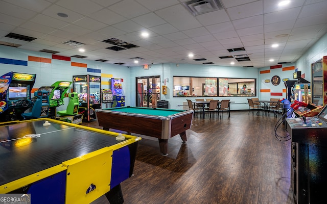 playroom with pool table, a drop ceiling, and dark hardwood / wood-style floors