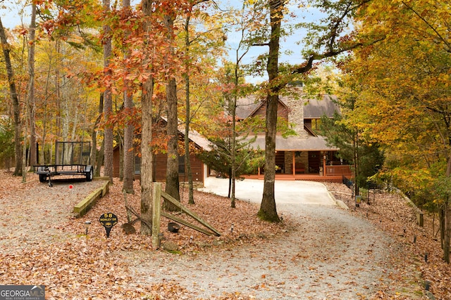 view of community with a wooden deck