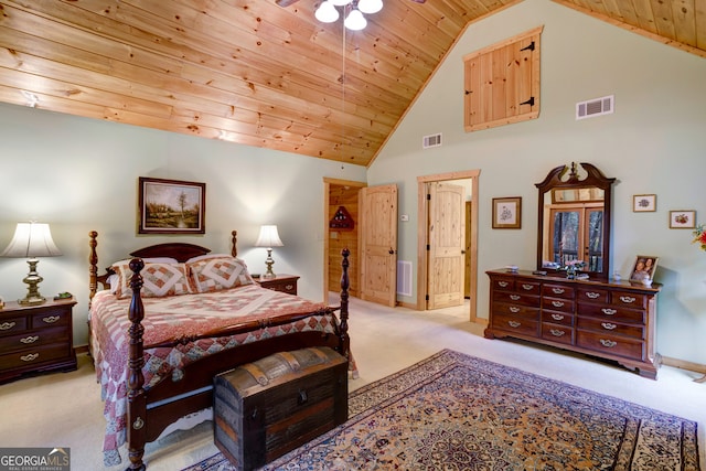 bedroom with light carpet, high vaulted ceiling, and wood ceiling