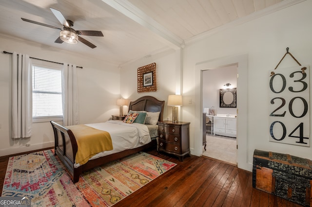 bedroom with connected bathroom, beam ceiling, dark wood-type flooring, ornamental molding, and ceiling fan