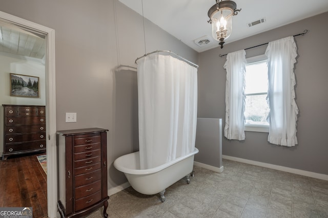 bathroom featuring a washtub