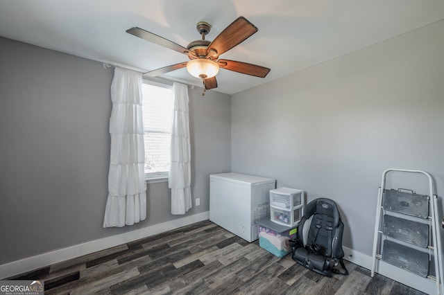 interior space featuring dark hardwood / wood-style floors and ceiling fan