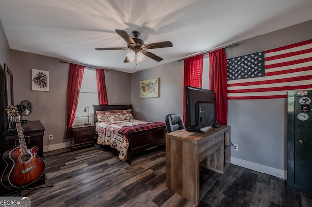 bedroom featuring dark hardwood / wood-style floors and ceiling fan