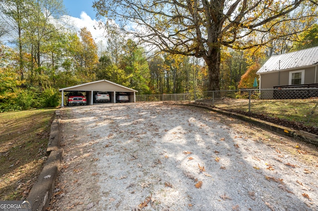 exterior space with a carport