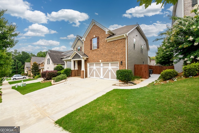 view of front of house featuring a front yard and a garage