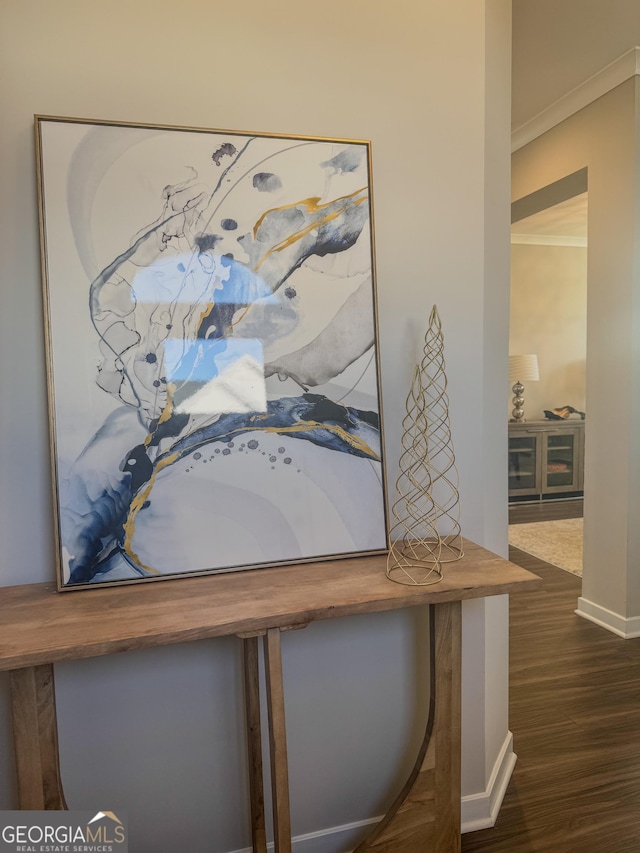 room details featuring wood-type flooring and crown molding