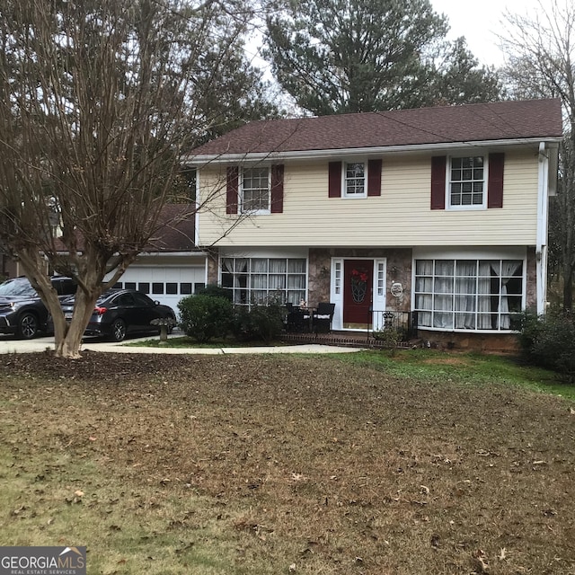 view of front of property featuring a garage