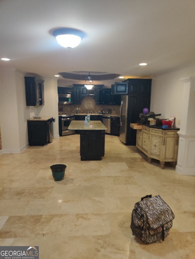 kitchen featuring a kitchen island and stainless steel appliances