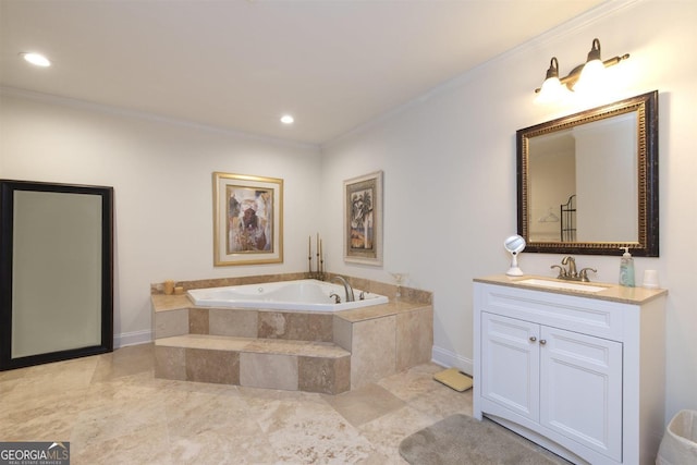 bathroom with vanity, tiled bath, and crown molding