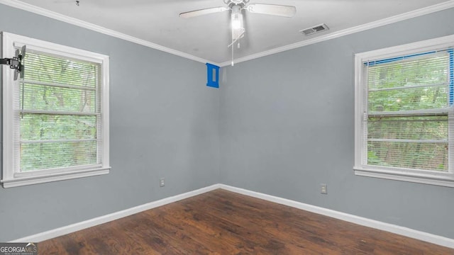 unfurnished room featuring wood-type flooring and a wealth of natural light