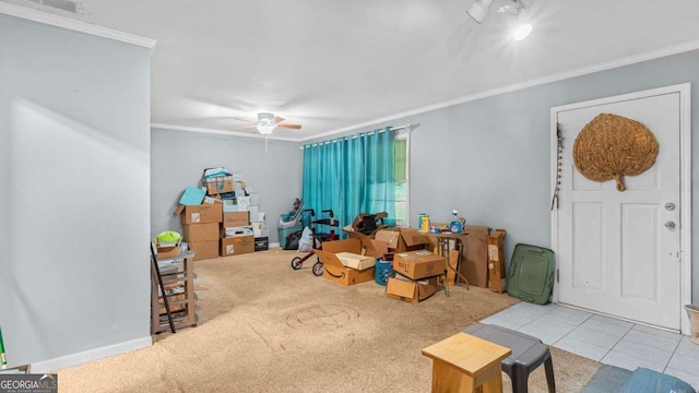 miscellaneous room featuring carpet, ceiling fan, and ornamental molding