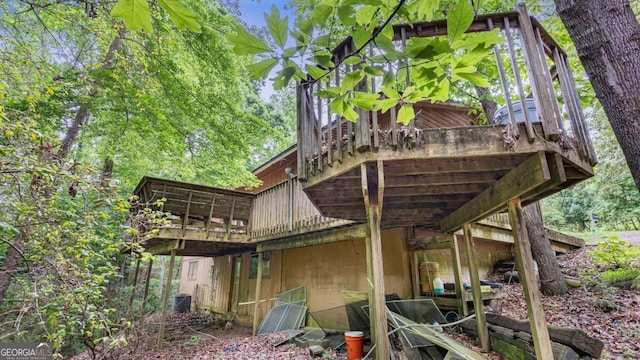 view of side of home featuring a deck