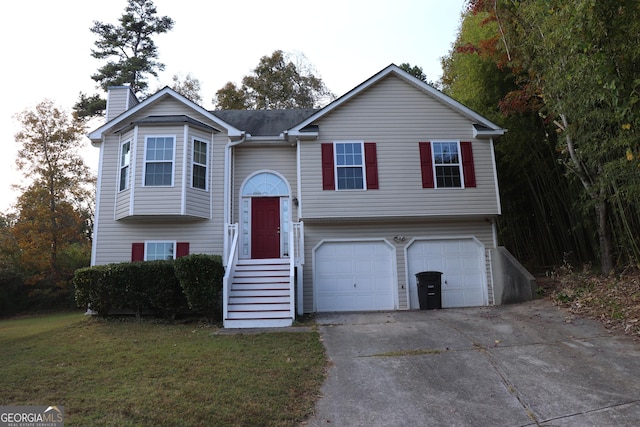 6995 Pine Shadow Way, Winston, GA 30187 - split foyer home featuring an attached garage, a chimney, concrete driveway, and a front yard