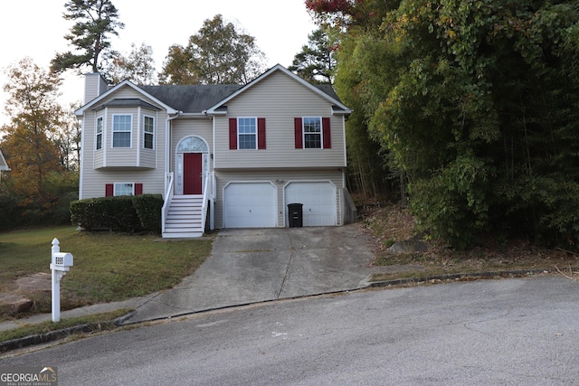 6995 Pine Shadow Way, Winston, GA 30187 - bi-level home featuring a garage, concrete driveway, a chimney, and a front yard