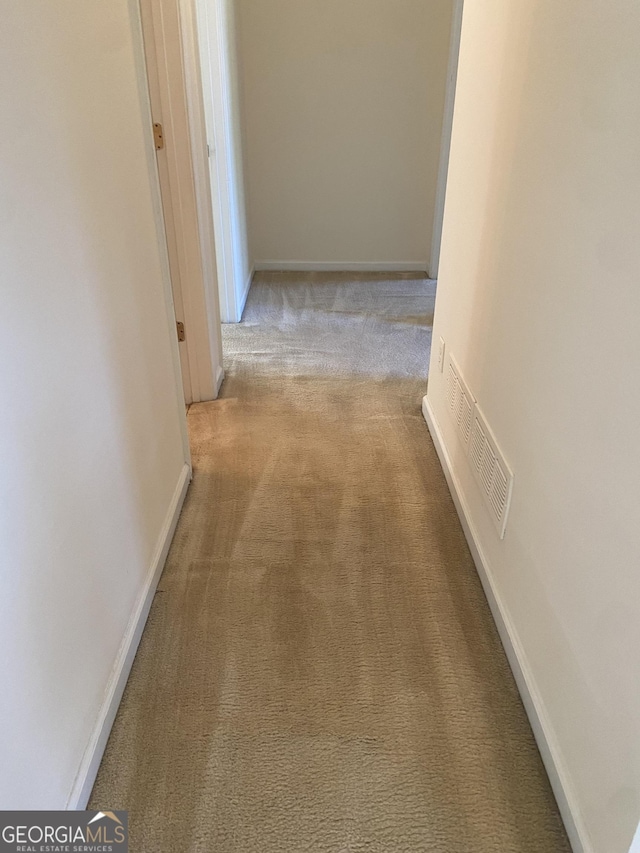 6995 Pine Shadow Way, Winston, GA 30187 - corridor with light carpet and baseboards