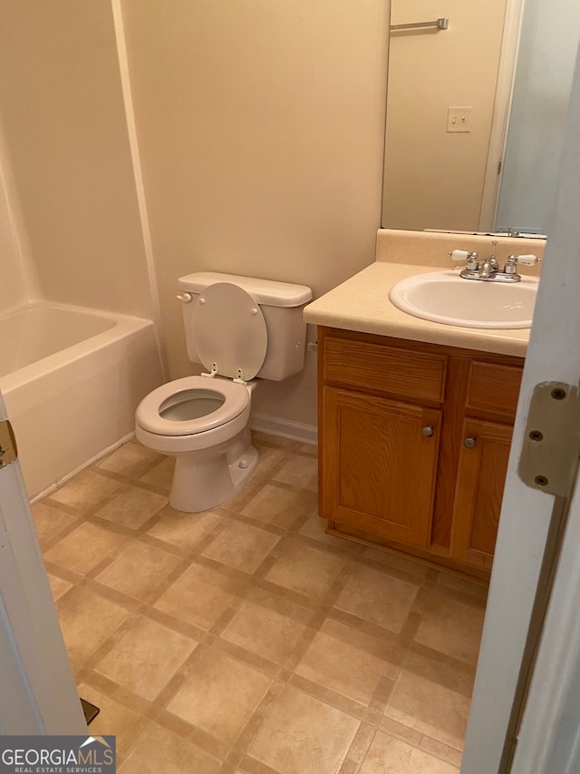 full bathroom with vanity, bathing tub / shower combination, and toilet